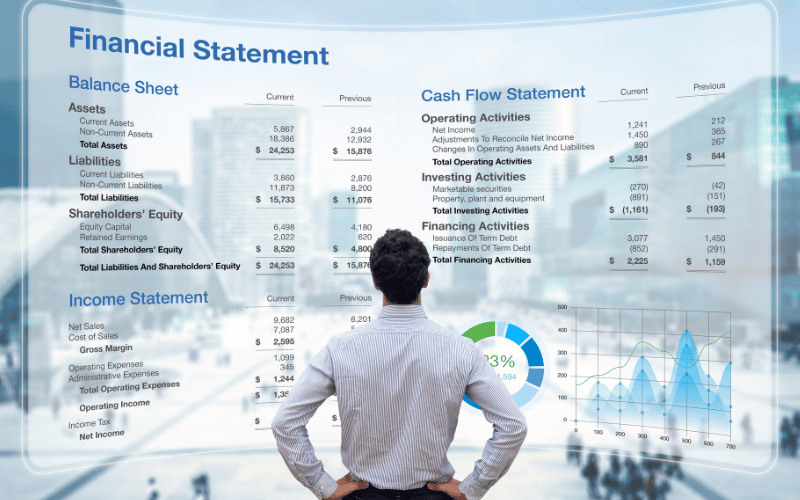 Person analyzing financial statements and charts on a transparent screen